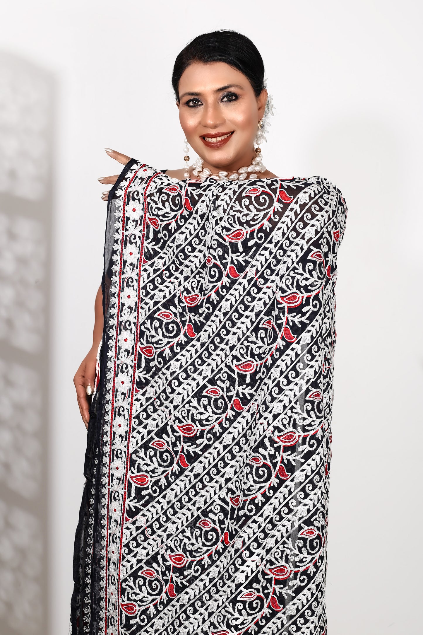 Weaving Mystery: Traditional Hand-Embroidered Cotton Suits Redefined ( UNSTITCHED )