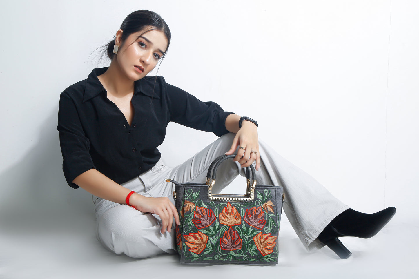 Artisan Chic: Embroidered Handbag Collection