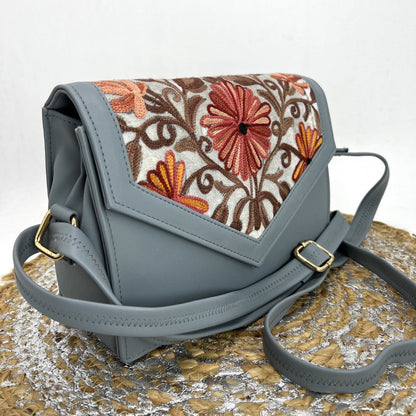 Handcrafted Embroidery Elegance: Signature Sling Handbag Charm