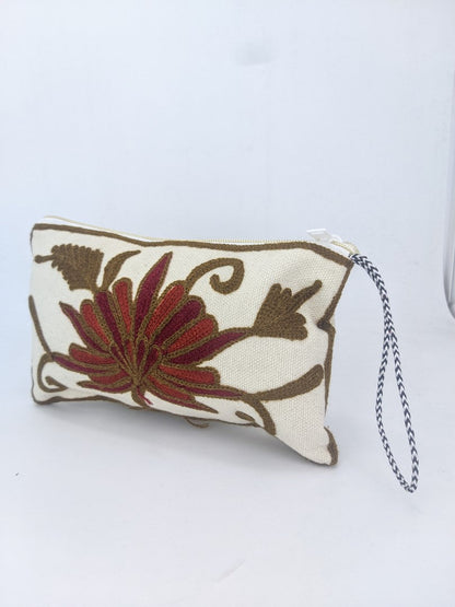 Crafted Comfort: Handmade Embroidered Pouch Trio