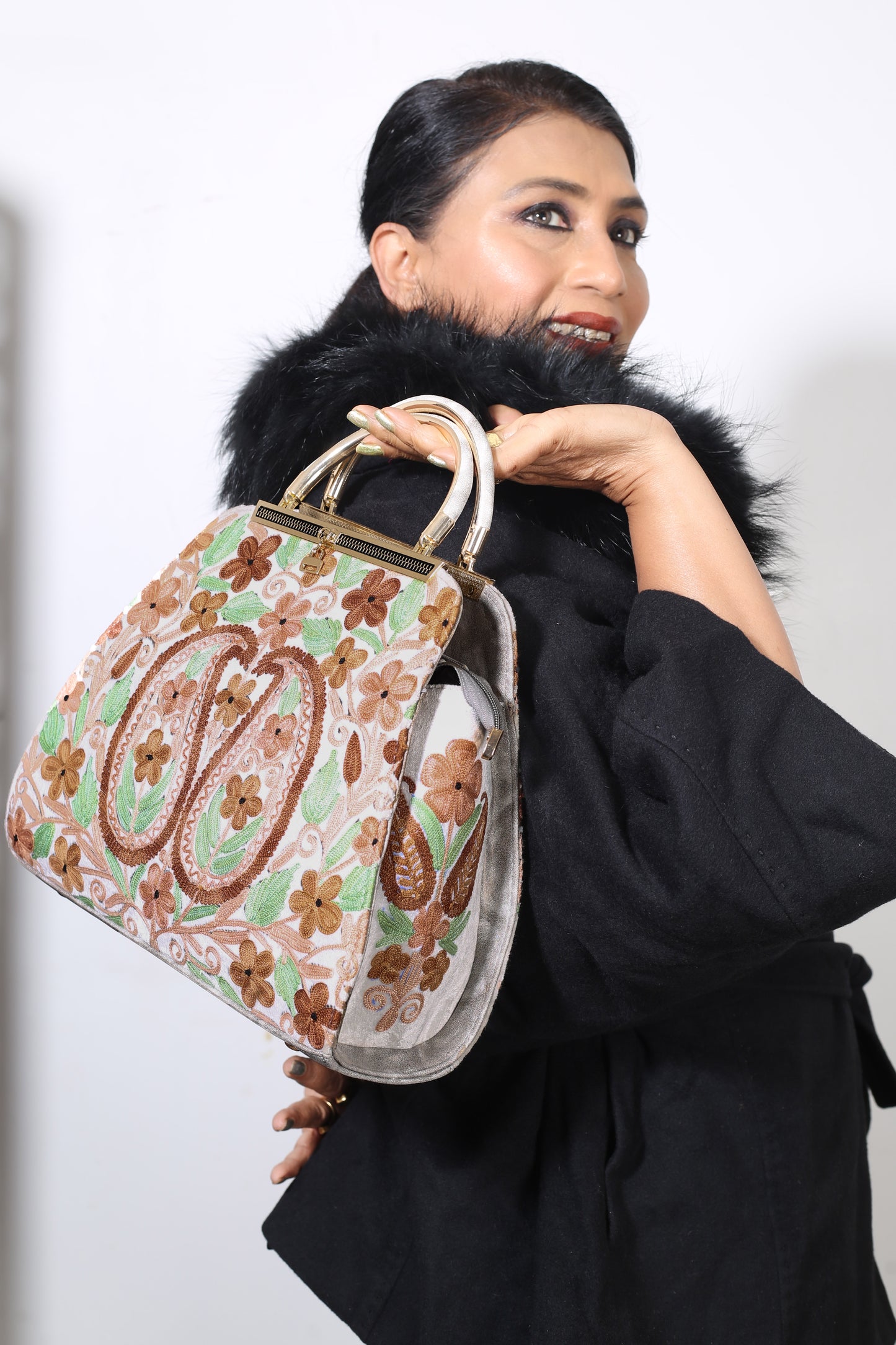 Weaving Mystery: Kashmir Couture Handcrafted Embroidered TRL Bag