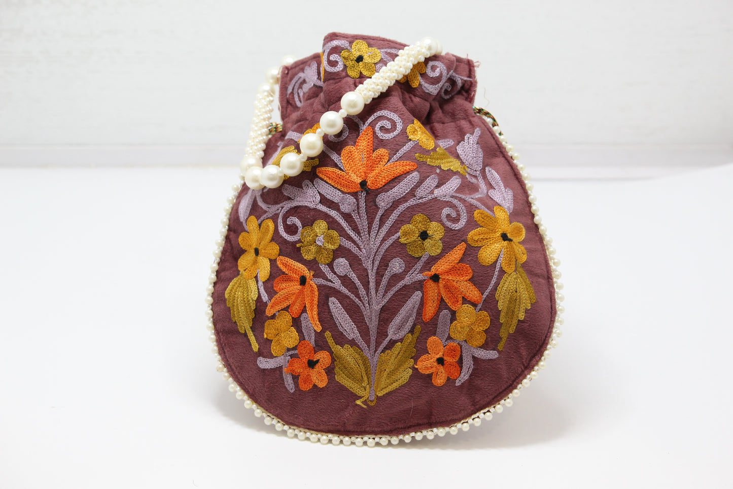 Artisanal Potlis: Handmade Embroidered Potli