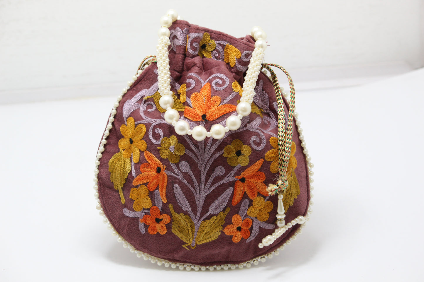 Artisanal Potlis: Handmade Embroidered Potli