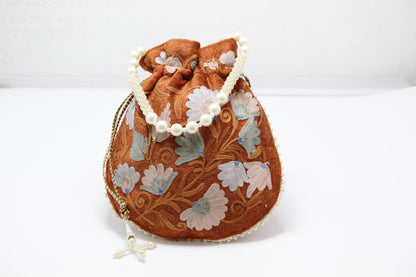 Potli Nest: Handmade Embroidered Potli