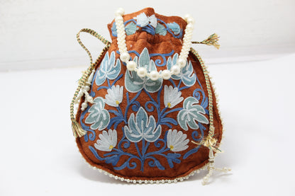 Stitched Luxe: Handmade Embroidered Potli