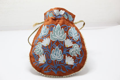 Stitched Luxe: Handmade Embroidered Potli