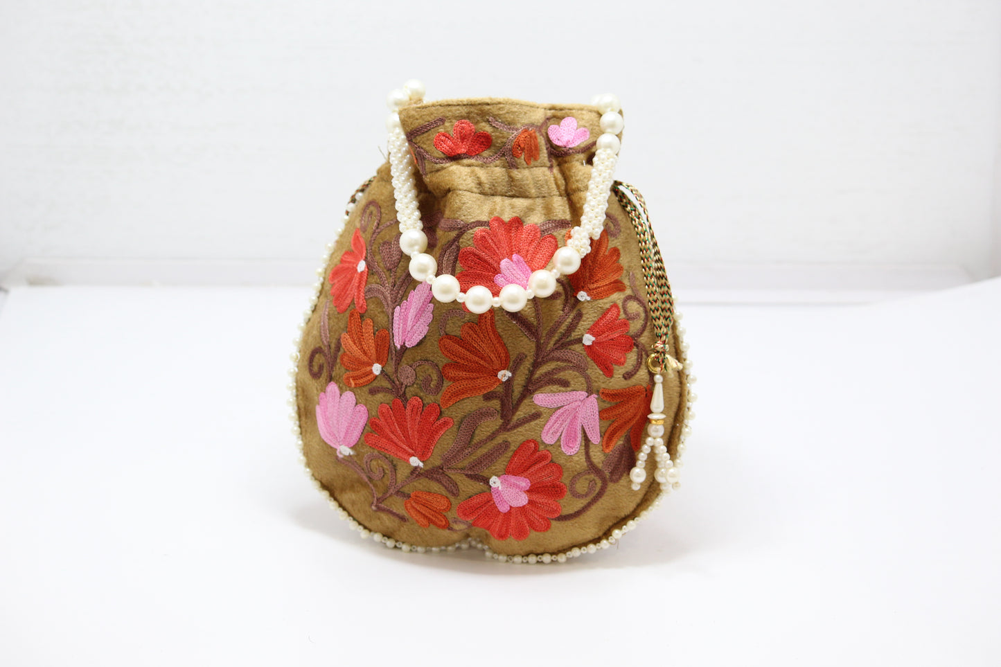 StitchCraft: Handmade Embroidered Potli