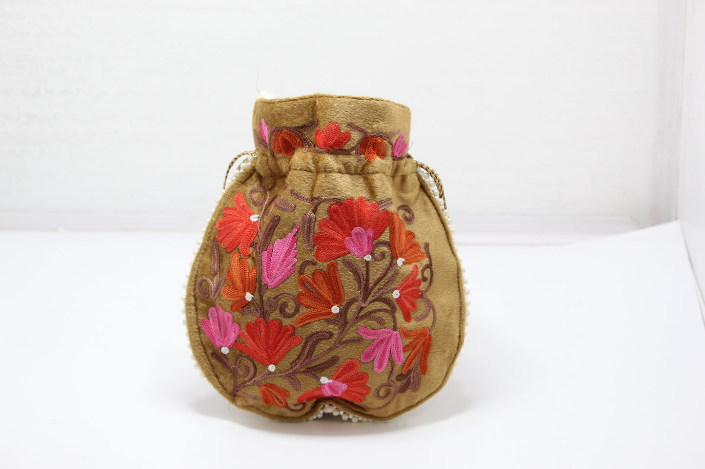 StitchCraft: Handmade Embroidered Potli