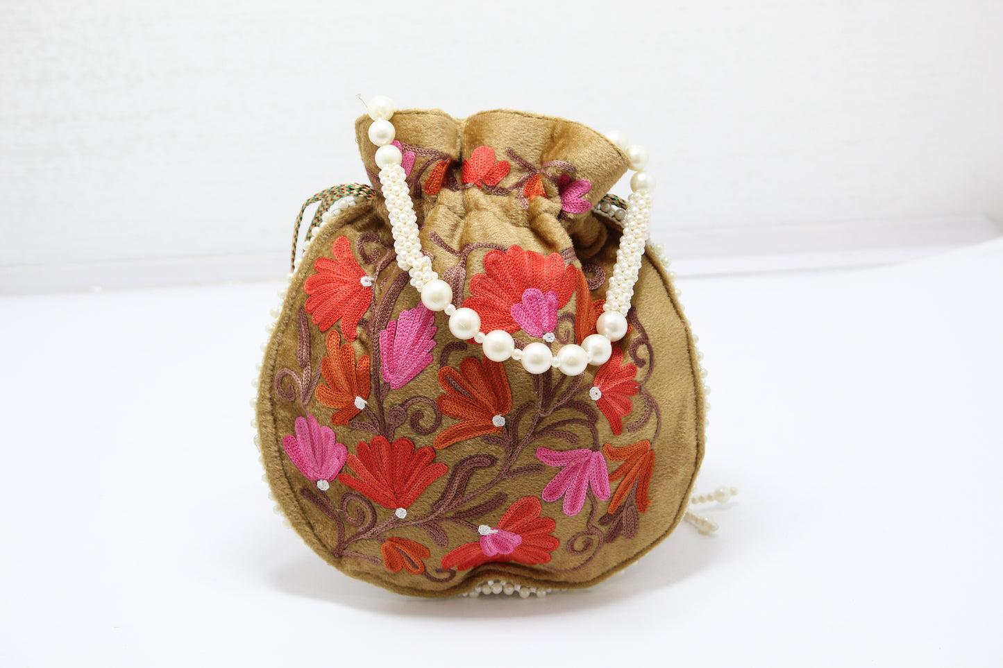 StitchCraft: Handmade Embroidered Potli