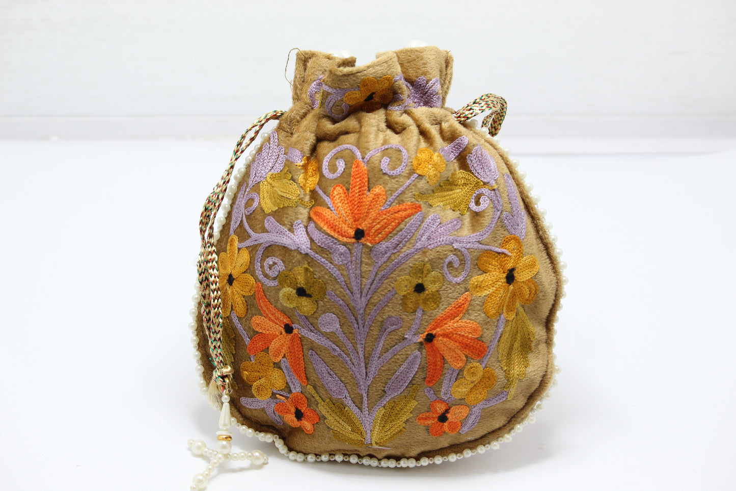 Opulent Orbit: Handmade Embroidered Potli