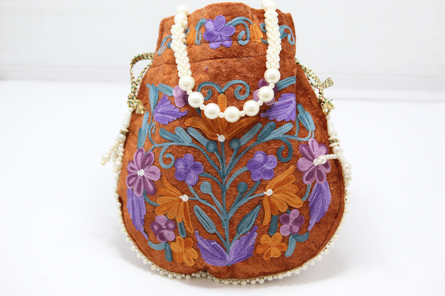 Twilight Touch: Handmade Embroidered Potli