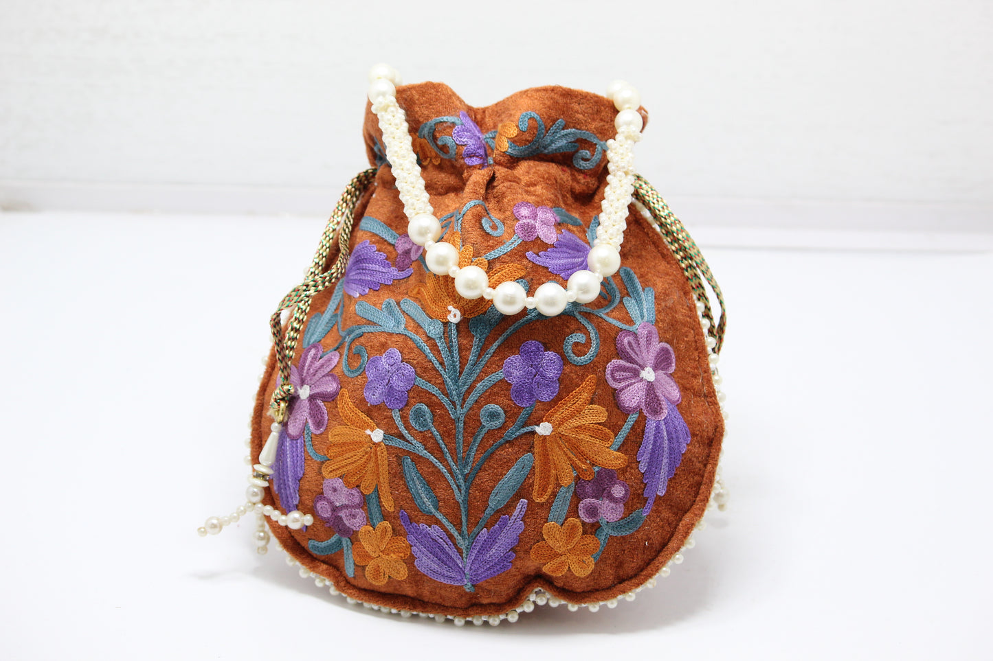 Twilight Touch: Handmade Embroidered Potli