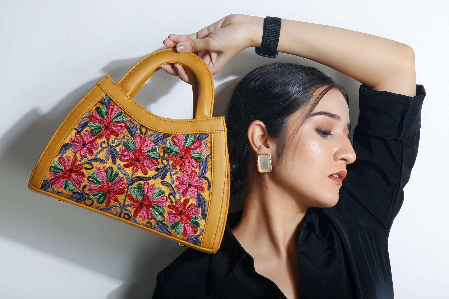 Embroidery Extravaganza: Handcrafted Handbag